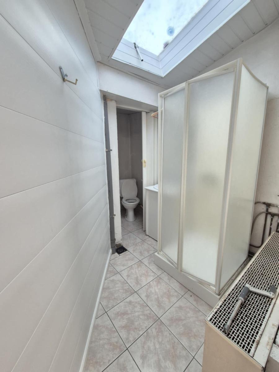 photo 11 du bien Immeuble avec partie professionnelle et privative 