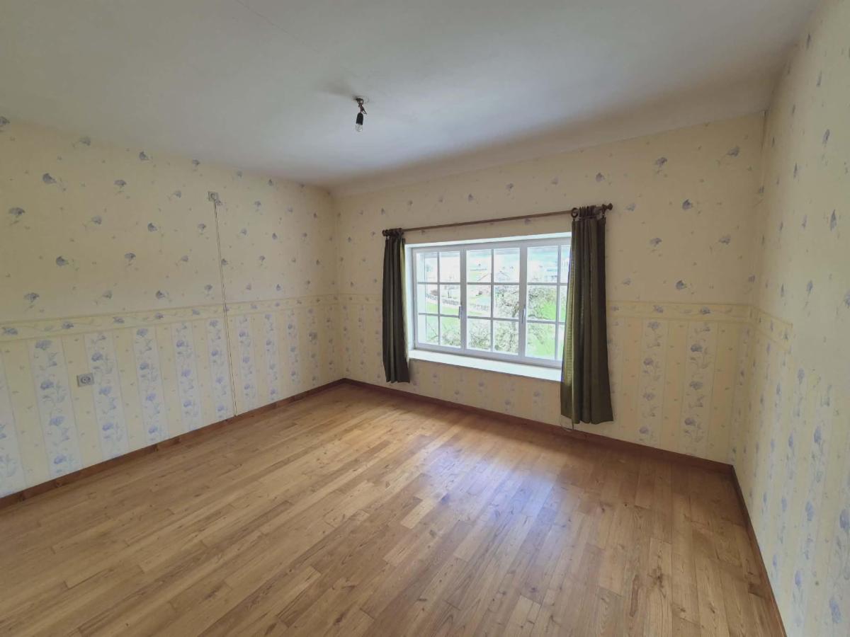 photo 16 du bien Une Maison d’habitation à moderniser avec Garage et Jardin