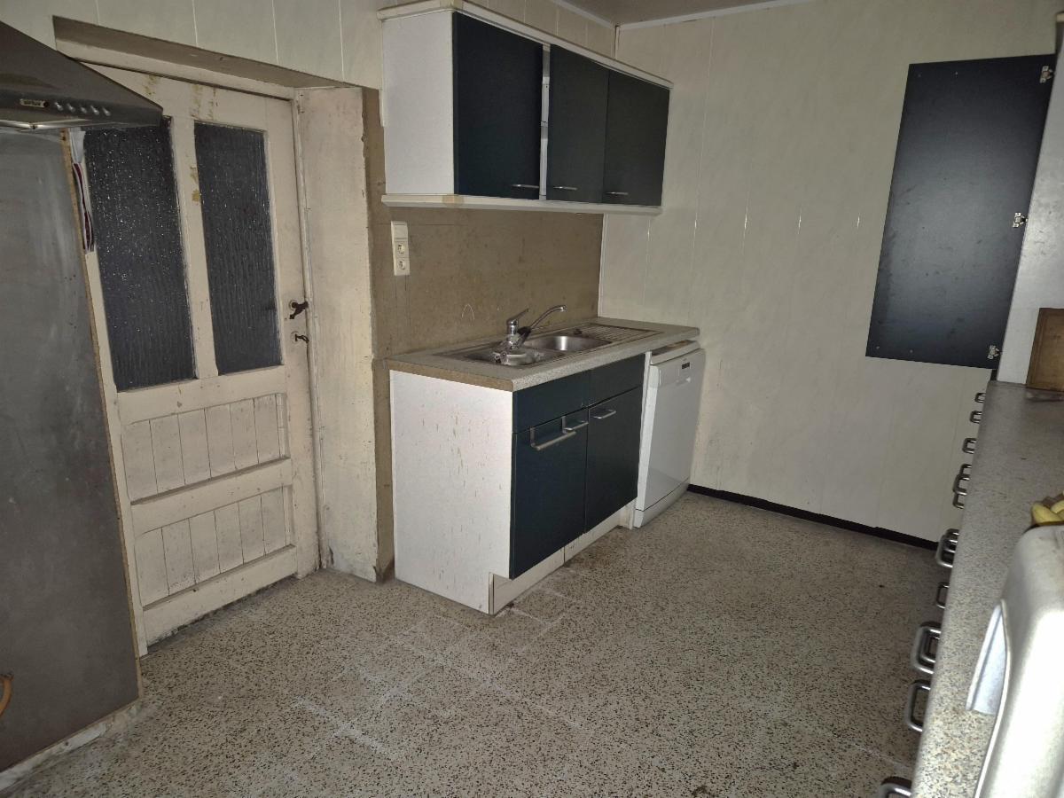 photo 7 du bien BÂTIMENT DE FERME AVEC TERRAIN ET 2 GARAGES – BEAU POTENTIEL