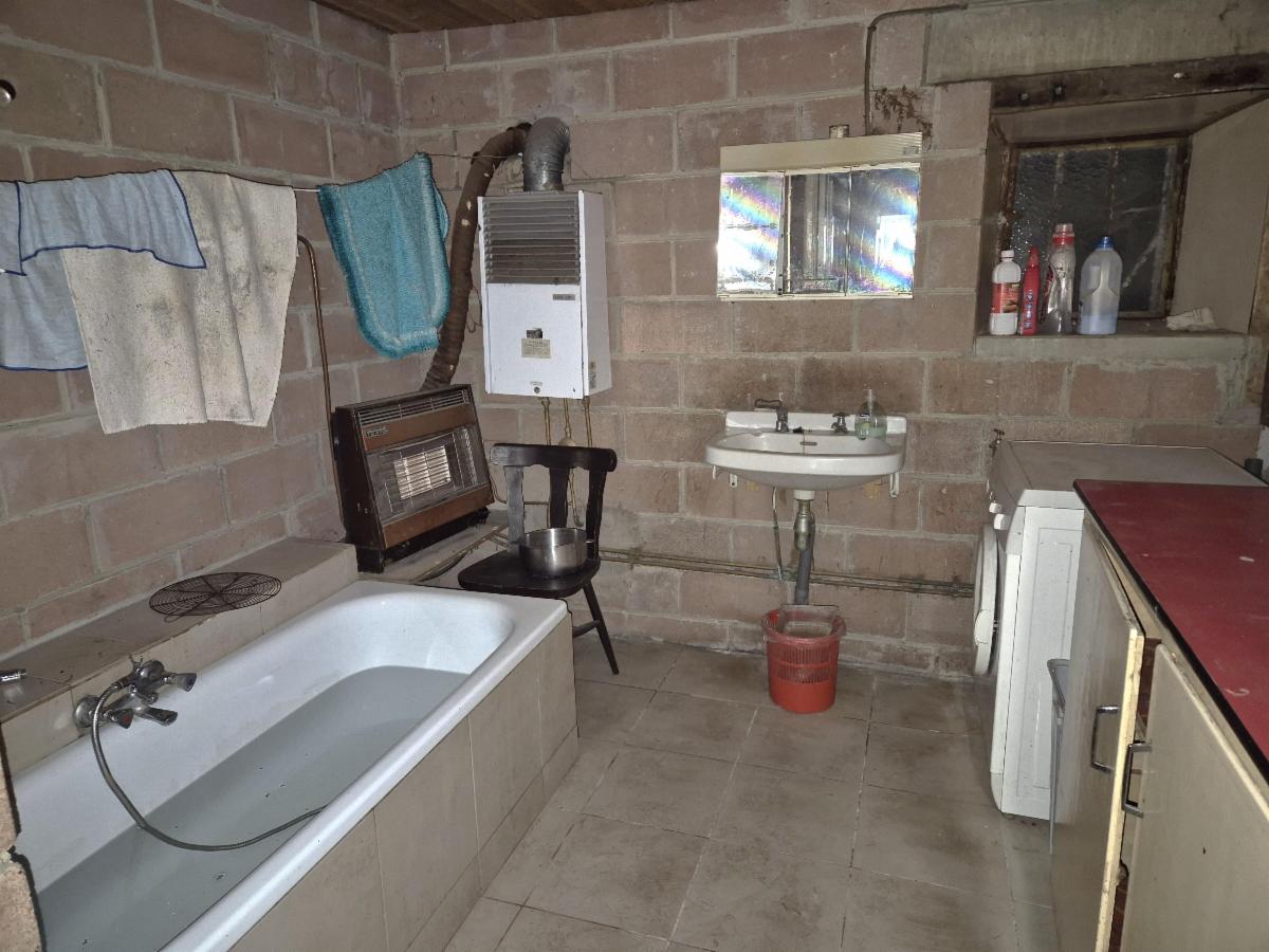 photo 9 du bien BÂTIMENT DE FERME AVEC TERRAIN ET 2 GARAGES – BEAU POTENTIEL