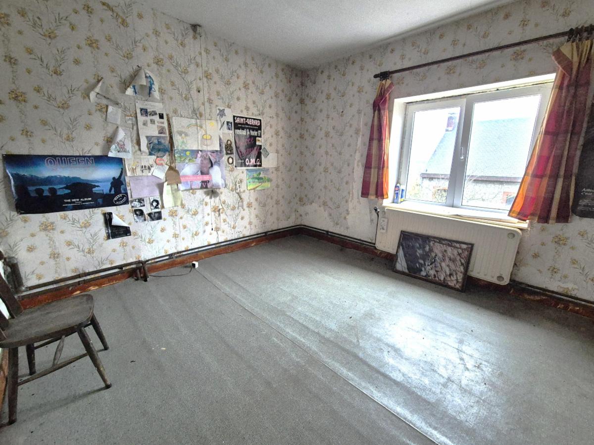 photo 10 du bien BÂTIMENT DE FERME AVEC TERRAIN ET 2 GARAGES – BEAU POTENTIEL