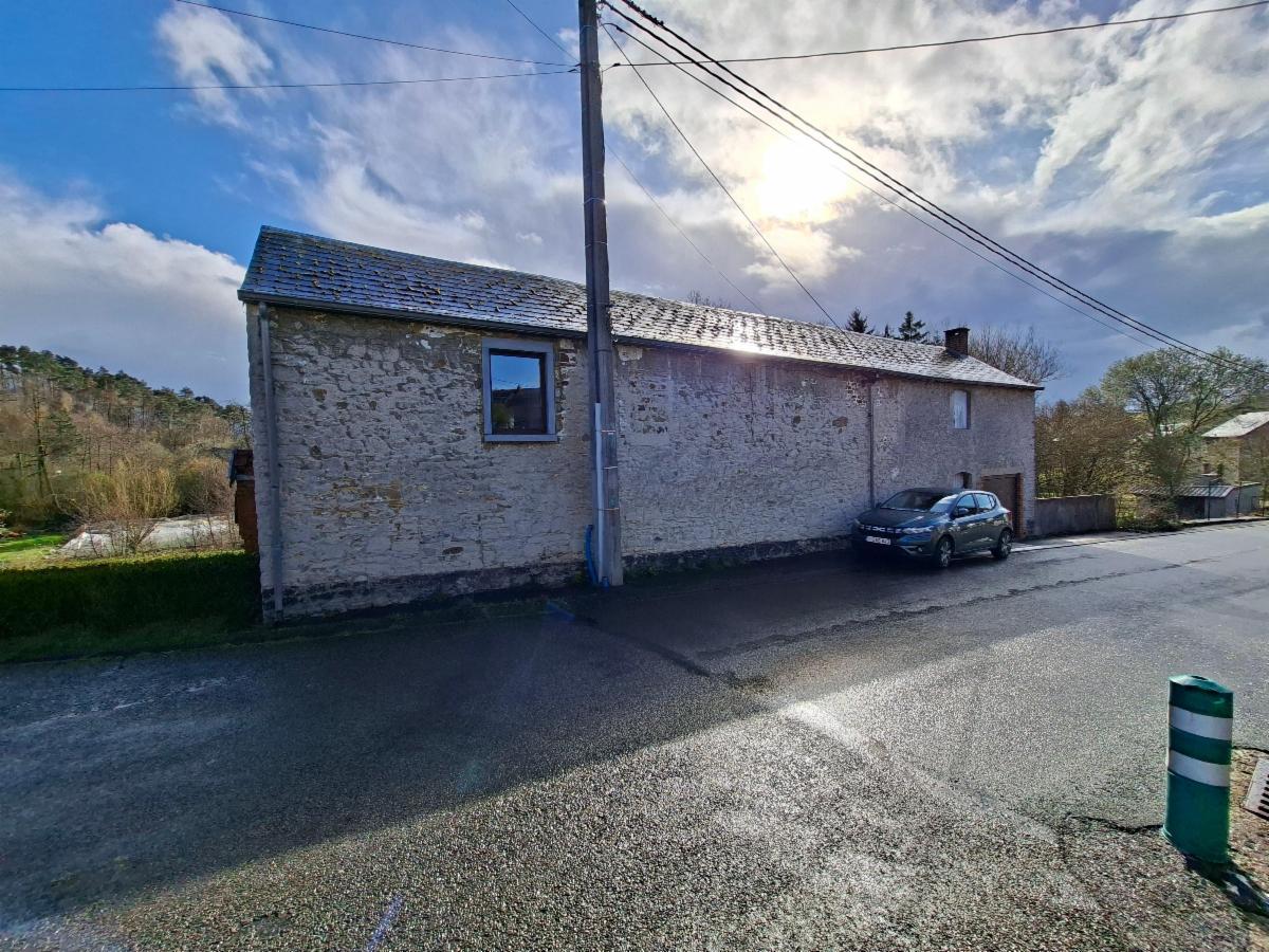 photo 1 du bien BELLE MAISON DE VILLAGE EN PIERRE 4 FAÇADES.