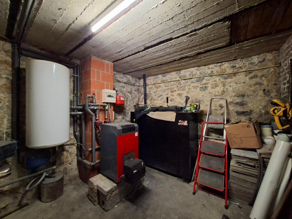 photo 8 du bien BELLE MAISON DE VILLAGE EN PIERRE 4 FAÇADES.