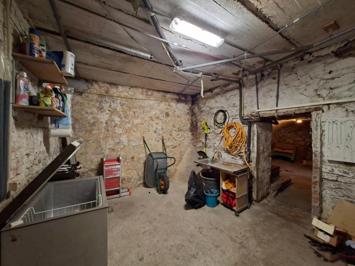 photo 9 du bien BELLE MAISON DE VILLAGE EN PIERRE 4 FAÇADES.