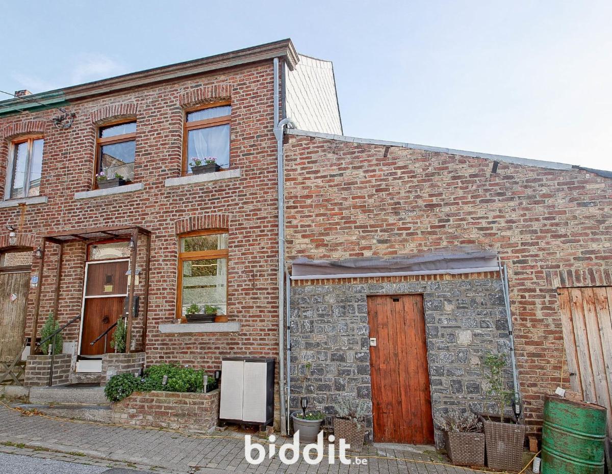 Située à proximité du centre-ville, une maison 2 façades