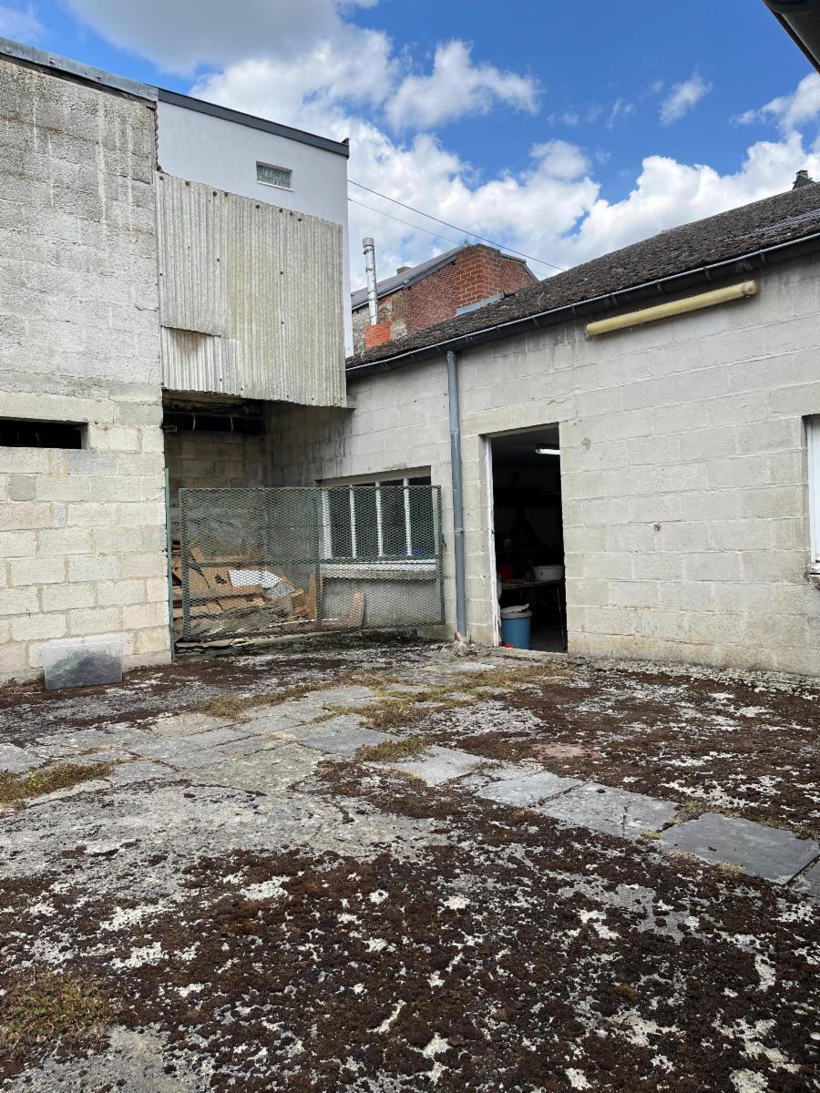 photo 9 du bien Un Ensemble Immobilier-Maison-Terrain-Logement Communautaire