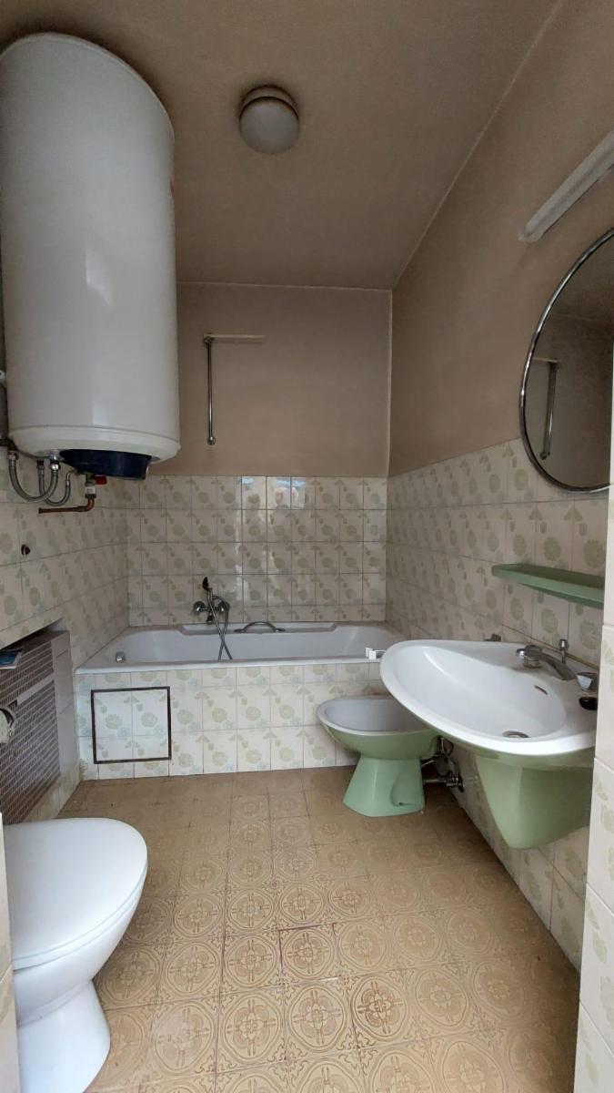 photo 11 du bien Maison de commerce avec maison,appartement,garage et jardin 