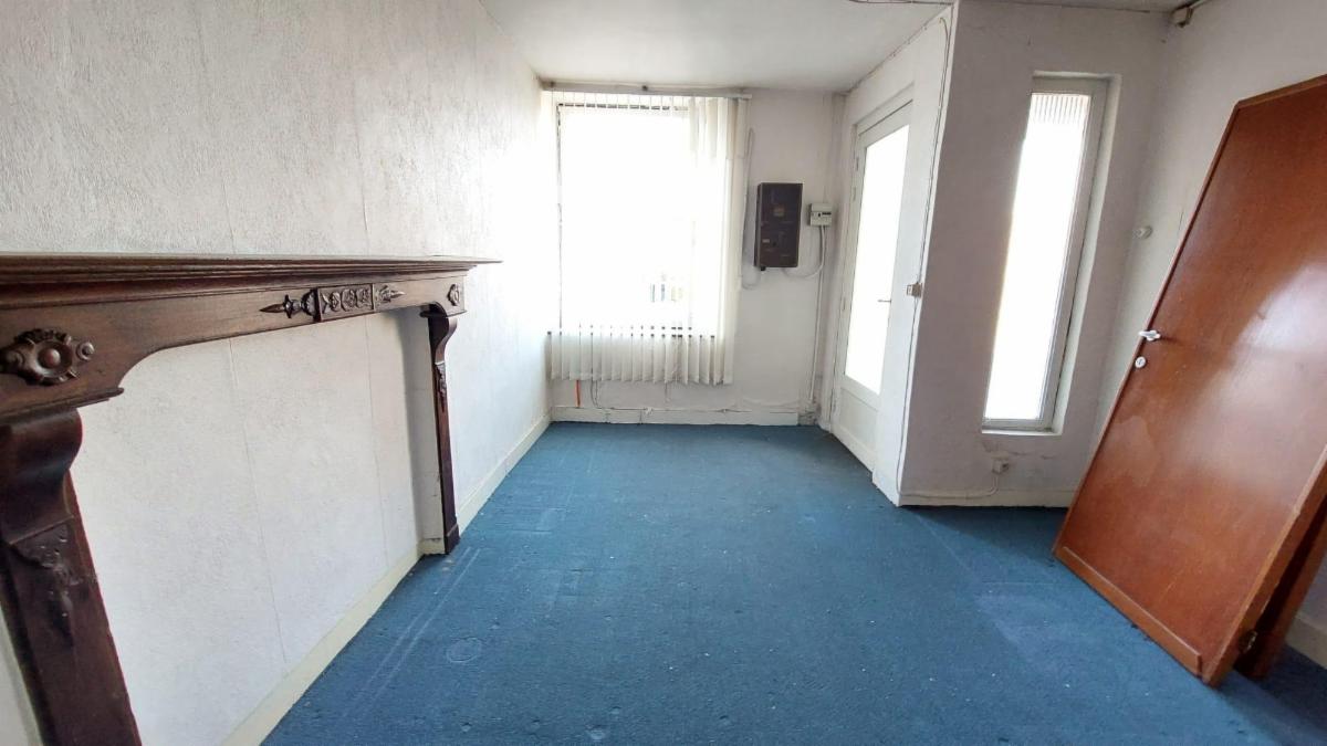 photo 13 du bien Maison de commerce avec maison,appartement,garage et jardin 