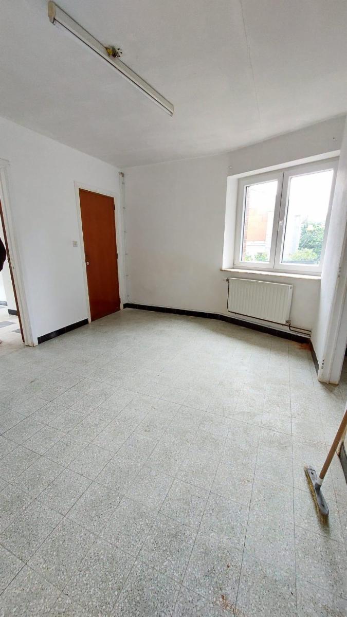 photo 20 du bien Maison de commerce avec maison,appartement,garage et jardin 